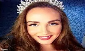 مدلی که در اوکراین تفنگ به دست شد/ عکس