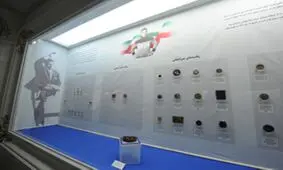ویترینی رنگارنگ از مدال‌های تختی در موزه آستان قدس رضوی