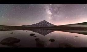 بیرون آمدن دماوند و کهکشان راه شیری از پشت ابرها/ ویدئو