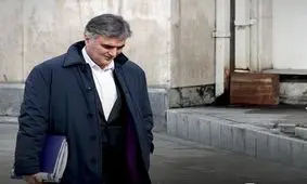 ماجرای عکس جنجالی فرزین با صرافان هرات چه بود؟