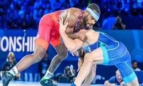 باروز آماده مبارزه با ایران/کشتی‌گیر مطرح جهان: وقت آن است صندل‌هایم را با کفش کشتی عوض کنم