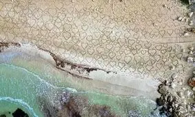 ۴۰۰ قلب روی شن؛ هدیه پدر به دختر بیمار