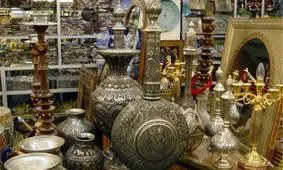 جام قهرمانی اولین دوره کشتی آزاد قهرمانی آسیا در یک عتیقه فروشی