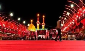 لحظه تعویض پرچم بارگاه حضرت سیدالشهدا (ع) / ویدئو