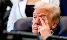 پرچم سفید ترامپ پای موشک های ایرانی/ کاریکاتور