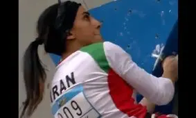 کشف حجاب الناز رکابی با پرچم جمهوری اسلامی ایران در مسابقات سنگ‌نوردی آسیا/ ویدئو

