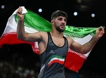 لحظاتی از کشتی سعید اسماعیلی با کودک سندروم داون/ ویدئو
