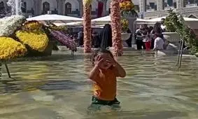 آب بازی در حرم امام رضا(ع)