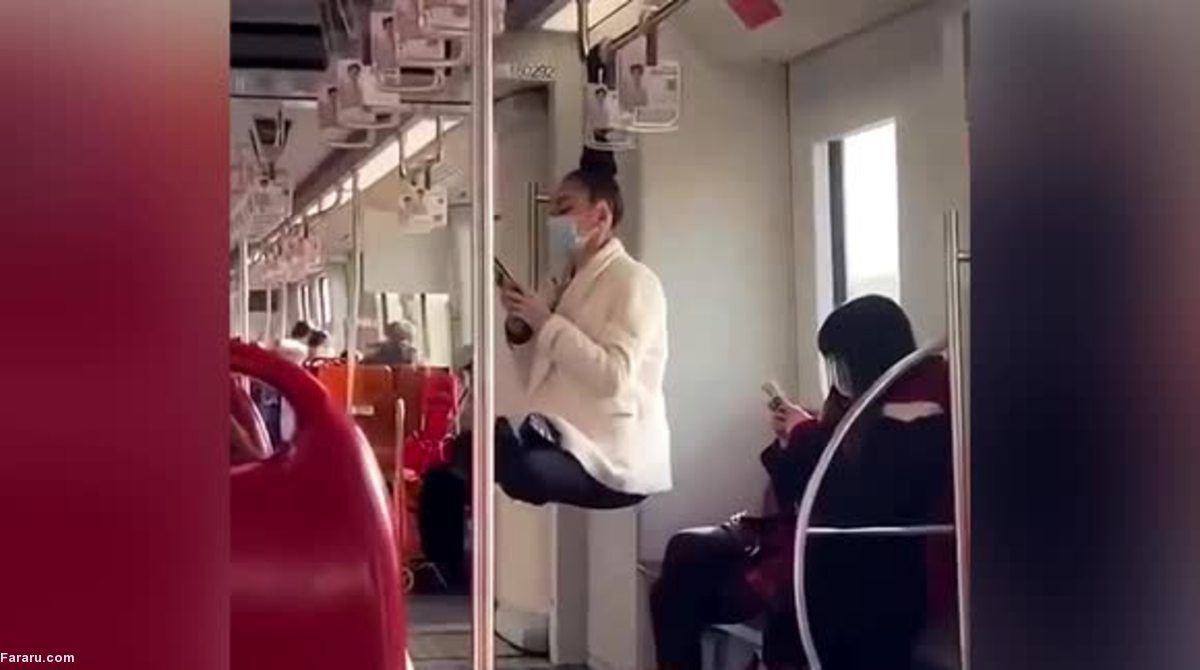 آویزان شدن یک زن با موهایش در مترو!/ ویدئو