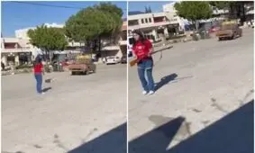  سگ کشی زن جوان با اسلحه جنجالی شد/ ویدئو