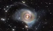 عکس روز ناسا از کهکشانی با ۳ حلقه

