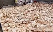 کشف صدها قرص نان از خانه‌ای در اراک
