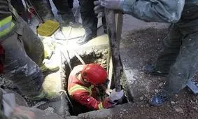 حبس کارگر جوان زیر خروارها خاک در تهرانپارس + تصاویر