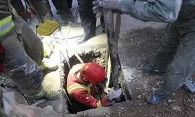 حبس کارگر جوان زیر خروارها خاک در تهرانپارس + تصاویر