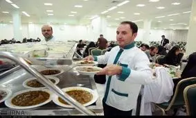 مراحل پخت و توزیع غذای متبرک رضوی‎ +تصاویر