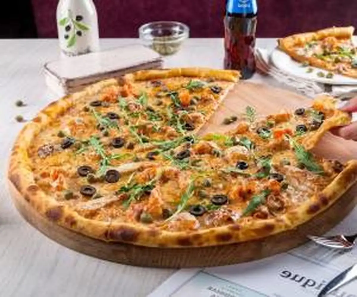 گوشی موبایلت رو بده پیتزای رایگان بخور ! + عکس