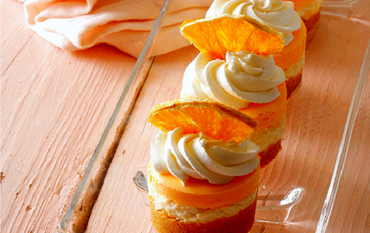روش تهیه چیزکیک یخچالی پرتقالی خوشمزه و مجلسی
