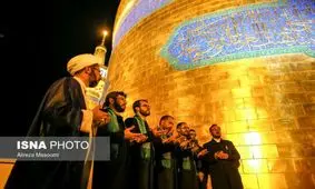 آئین تعویض پرچم و گلباران حرم رضوی+ عکس