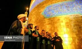 آئین تعویض پرچم و گلباران حرم رضوی+ عکس