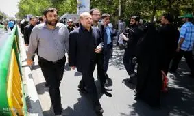 توضیحات الیاس قالیباف پسر شهردار سابق تهران درباره عکس پدرش با هادی رضوی متهم بانک سرمایه