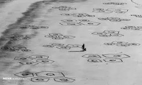 نقاشی روی شن های ساحل‎+ عکس