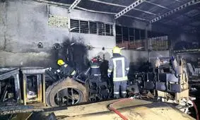 مهار آتش سوزی کارگاه تولید مصنوعات چوبی در مشهد