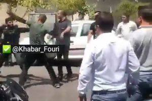 فیلم| ضرب و شتم مأمور نیروی انتظامی