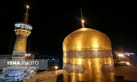 تعویض پرچم گنبد حرم رضوی در آغاز ماه محرم+ عکس