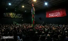 مراسم علم‌کشی مهاجران افغانستانی در مشهد+ عکس