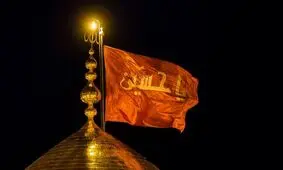 آیین تعویض پرچم گنبد حرم امام حسین(ع)