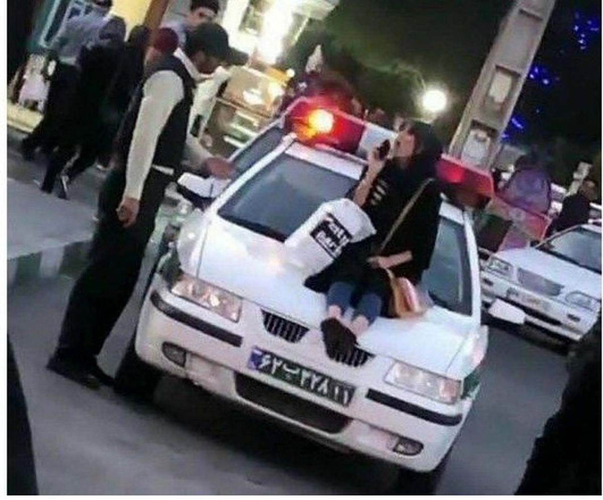 حکم قضایی برای خانم دکتری که روی خودروی پلیس کشف حجاب کرد / ویزیت رایگان به جای زندان