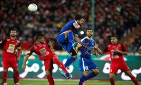 شعار علیه قلعه‌نویی و استقلال در ورزشگاه آزادی