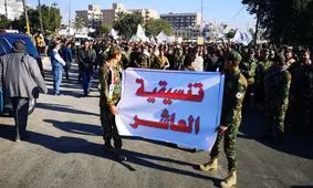 تشییع پیکر شهدای الحشد الشعبی در بغداد؛ مردم خواستار اخراج آمریکا شدند / عکس