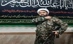 امام جمعه اسالم با پوشش نظامی و سلاح به دوش در نماز جمعه امروز حضور یافت