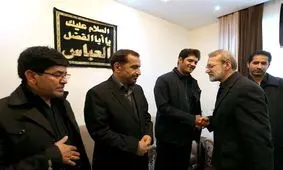 حضور لاریجانی در منزل شهید ابومهدی المهندس و سردار شهید حسین پورجعفری