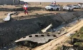 عکس یادگاری زوج کشته شده در سقوط هواپیمای اوکراینی با سردار شهید سلیمانی