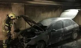 مهار آتش سوزی خودرو در پارکینگ ساختمان پنج طبقه