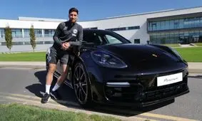 گفت‌وگویی کوتاه با جهانبخش درباره عکس‌هایش با پورشه