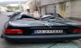 خسارت دیدن خودروها در تهران بر اثر توفان / عکس