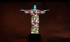 پرچم ایران و باقی کشورهای درگیر کرونا روی مجسمه بزرگ مسیح ریودو ژانیرو