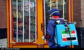 ضدعفونی خیابان‌های شهر قم توسط نیروهای حشدالشعبی / عکس
