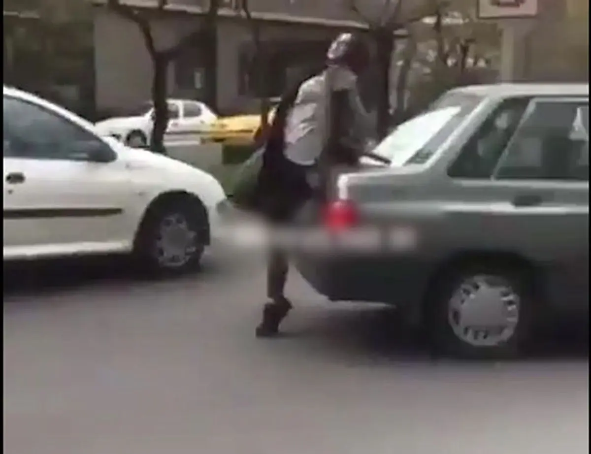 عذرخواهی دختری که شیشه‌های کانکس پلیس خیابان اندرزگوی تهران را شکست / فیلم