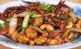 طرز تهیه خوراک مرغ و بادام هندی