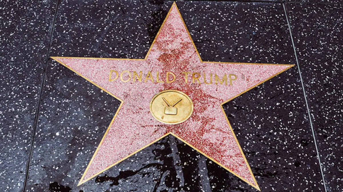 ستاره ترامپ در هالیوود سیاه شد/ عکس