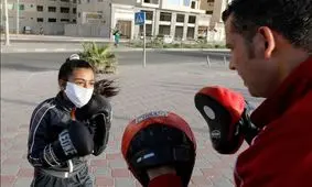 (تصاویر) تمرین دختران بوکسور غزه در خیابان