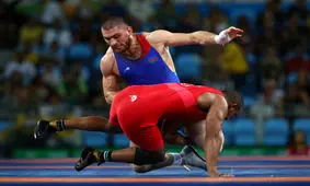 قهرمان کشتی المپیک و جهان کرونا گرفت