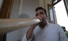مراسم نقاره زنی همزمان با شب میلاد حضرت امام رضا (علیه السلام)