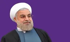 تبلیغ روحانی با عکس پاره شده روی یک وانت آبی