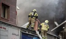 تصویری از آتش‌سوزی در خیابان انقلاب/ حریق اطفا شد