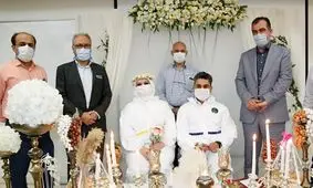 عکس‌های عجیب از عروسی زوج پرستار در بیمارستان کرونایی اهواز